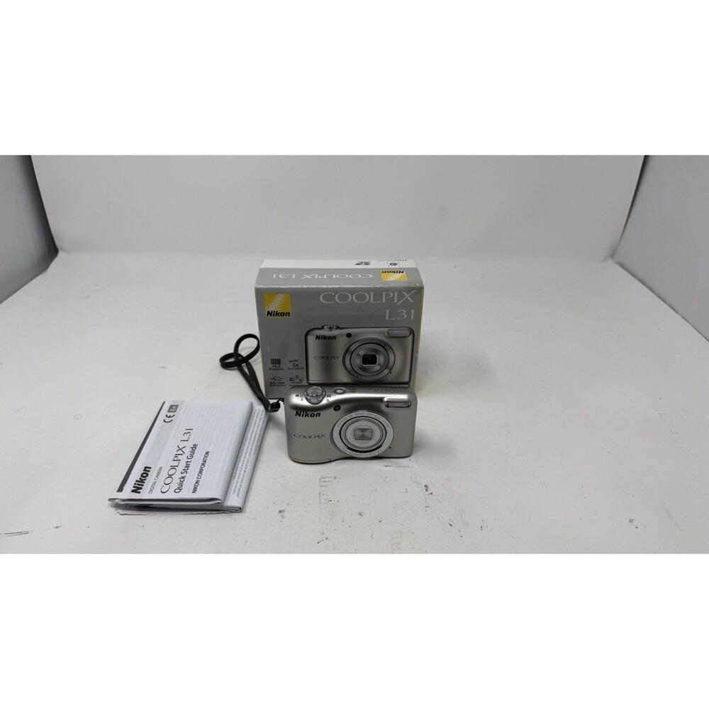 Nikon COOLPIX L31 16.1MP 5x Optical Zoom Silver Digital Camera W/ Box Works